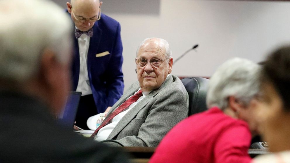 Curtis Reeves, center, looks back toward his wife, Vivian Reeves, right, while attends closing arguments during his second-degree murder trial on Friday, Feb 25, 2022, at the Robert D. Sumner Judicial Center in Dade City, Fla. Reeves is accused of sh