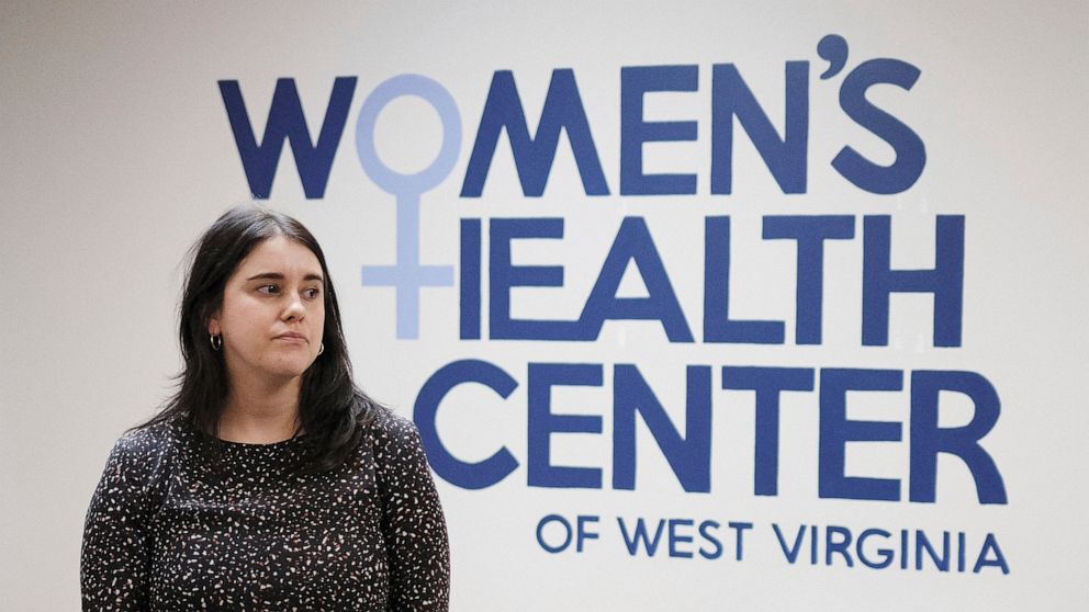 FILE - The Women's Health Center of West Virginia Executive Director Katie Quiñonez poses for a photo in Charleston, W.Va., Feb 25, 2022. On Tuesday, Sept. 13, 2022, West Virginia lawmakers passed a bill outlawing abortions except for in medical emer