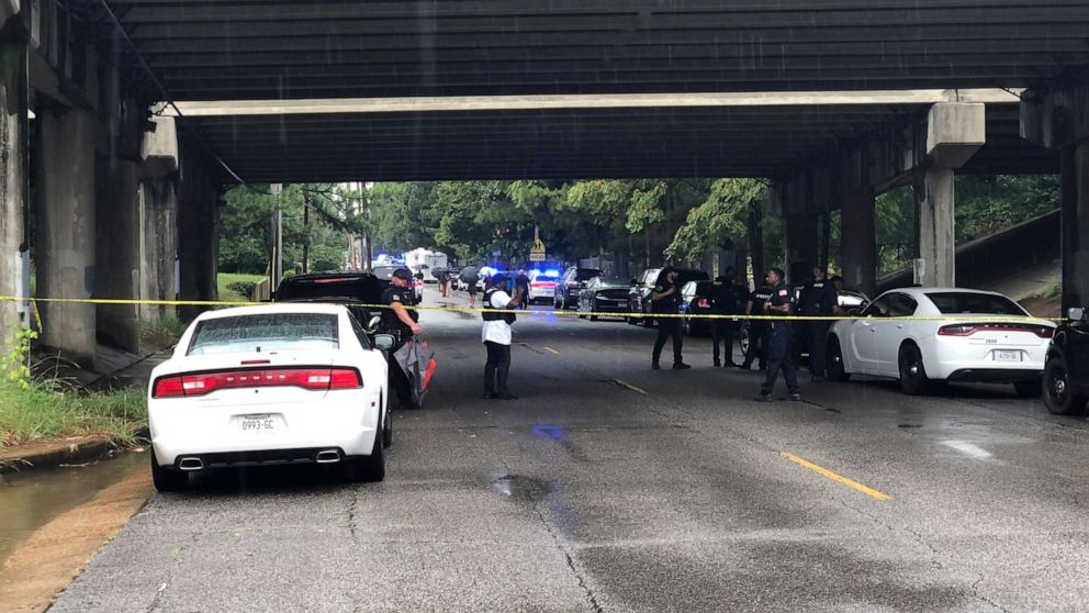 Police respond to the scene of a shooting on Thursday, Sept. 30, 2021 in Memphis, Tenn. Authorities say a boy was shot and wounded at a school. Memphis Police said in a statement that the shooting was reported Thursday morning at Cummings School, whi