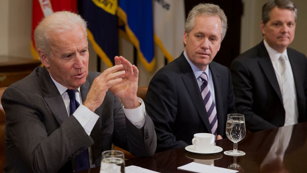 FILE - In this Thursday, Jan. 23, 2014, file photo, Vice President Joe Biden, left, speaks during a meeting with U.S. mayors including Louisville, Ky. Mayor Greg Fischer, center, to discuss workforce development, in the Roosevelt Room of the White Ho