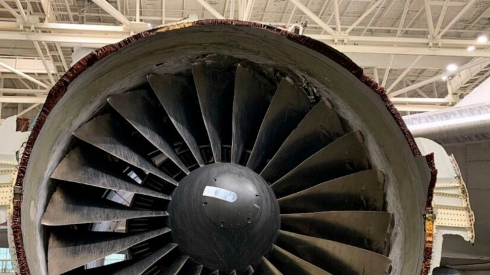 This photo provided by The National Transportation Safety Board shows the damaged engine of United Airlines Flight 328. Federal safety officials are updating their investigation into the engine failure on the United Airlines plane that sent parts of 