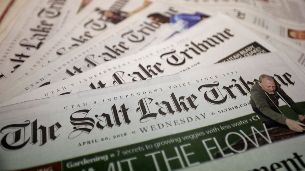 FILE - Copies of The Salt Lake Tribune newspaper are shown on April 20, 2016, 2020, in Salt Lake City. The Salt Lake Tribune will stop printing a daily newspaper after nearly 150 years at the end of the year and move to a weekly print edition. The ne
