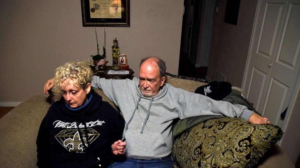 Jeff and Sabrina Aston sit in their Colorado Springs, Colo., home on Sunday, Nov. 20, 2022. The couple's 28-year-old son, Daniel Aston, was one of five people killed when a gunman opened fire in a gay nightclub in Colorado Springs on Saturday night. 