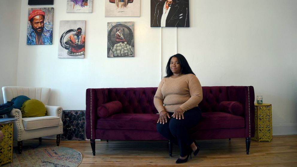Sarah Woodson poses for a portrait in Denver on Saturday, April 3, 2021. Woodson, the executive director of the advocacy group The Color of Cannabis, runs a 10-week business course to help students navigate Colorado's social equity application proces