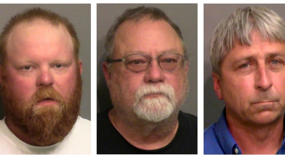 FILE - This combo of booking photos provided by the Glynn County, Ga., Detention Center, shows from left, Travis McMichael, his father Gregory McMichael, and William "Roddie" Bryan Jr. A Georgia judge says he won't allow attorneys for the men charged