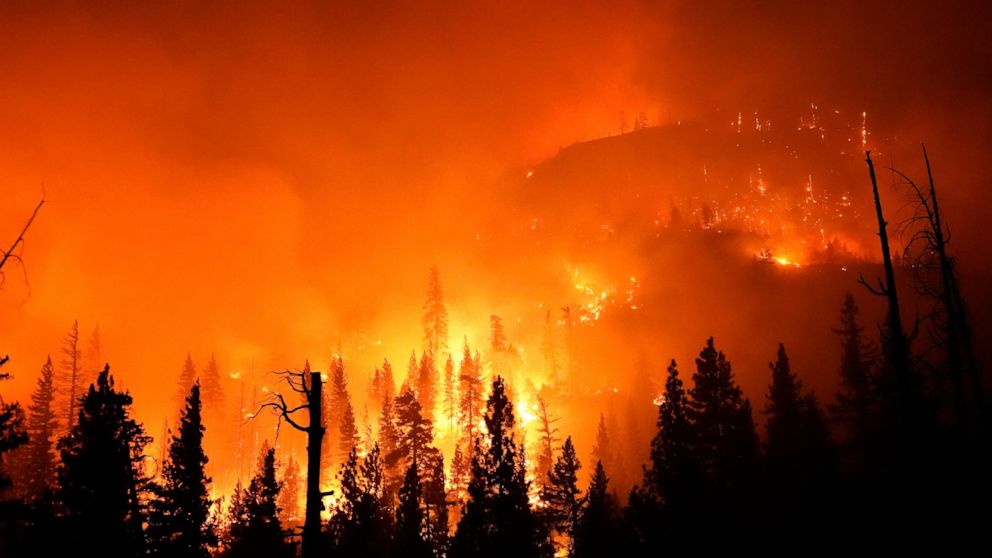 FILE - In this Sept. 6, 2020, file photo, the Creek Fire burns in the Sierra National Forest near Big Creek, Calif. The U.S. Forest Service says lightning likely ignited a 2020 wildfire in California's Sierra National Forest but they could not determ