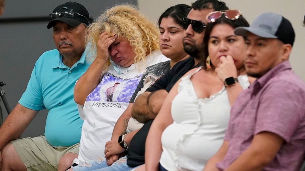 Family of shooting victims listen to the Texas House investigative committee release its full report on the shootings at Robb Elementary School, Sunday, July 17, 2022, in Uvalde, Texas. (AP Photo/Eric Gay)
