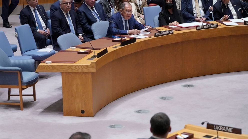 Ukraine's Foreign Minister Dmytro Kuleba, bottom, right, listens as Russia's Foreign Minister Sergey Lavrov speaks during a high level Security Council meeting on the situation in Ukraine, Thursday, Sept. 22, 2022, at United Nations headquarters. (AP
