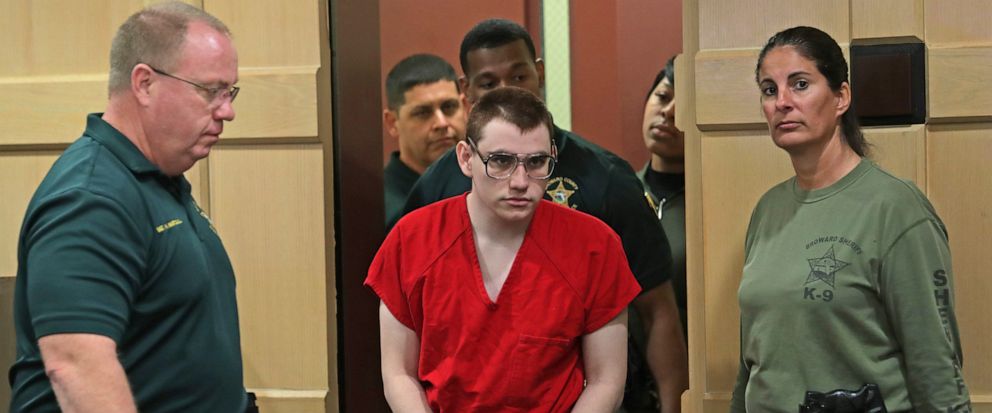 FILE - In this Wednesday, Jan. 16, 2019, file photo, Parkland school shooting suspect Nikolas Cruz is escorted into the courtroom for a status hearing at the Broward Courthouse in Fort Lauderdale, Fla. A series of defense motions are set to be heard 