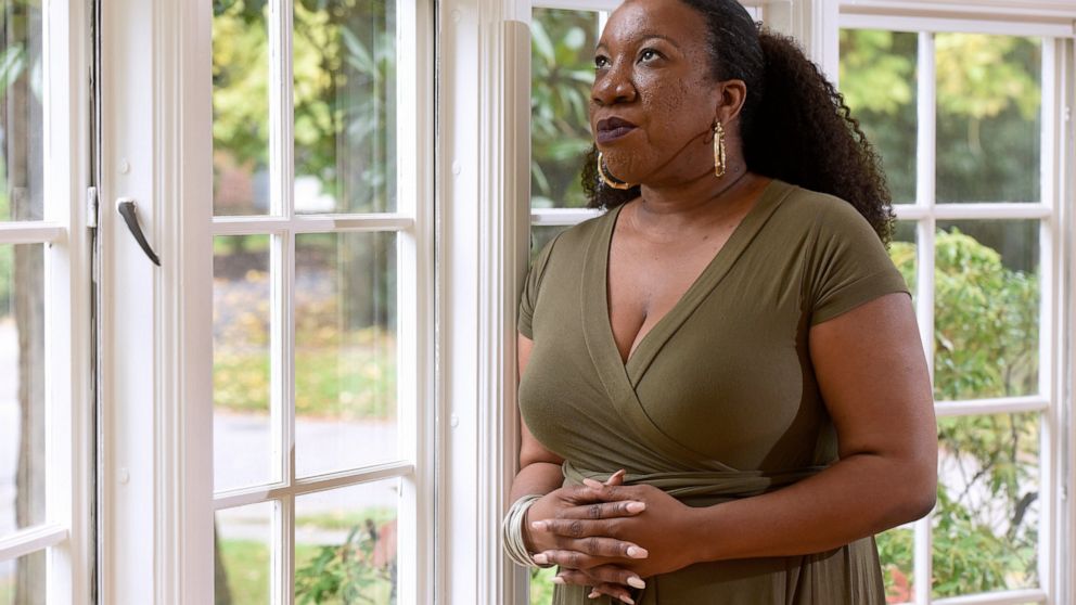 FILE - In this Tuesday, Oct. 13, 2020 file photo, Tarana Burke, founder and leader of the #MeToo movement, stands for a portrait in her home in Baltimore. For Burke, her first reaction to the Wednesday, June 30, 2021, Pennsylvania court decision on B