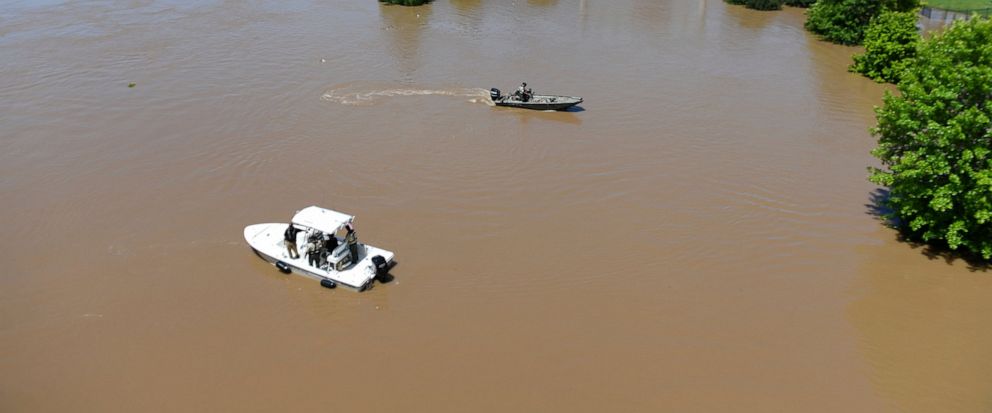 The Arkansas River floods Harry E. Kelley River Park Thursday, May 30, 2019, in Fort Smith, Ark. (AP Photo/Michael Woods)