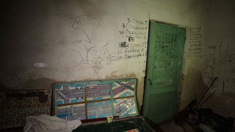 Markings are shown made by children and adults in the basement of a school which was used as a bomb shelter for children and their parents, as their village was being attacked by Russian strikes, in Yahidne village, northern Chernihiv region, Ukraine