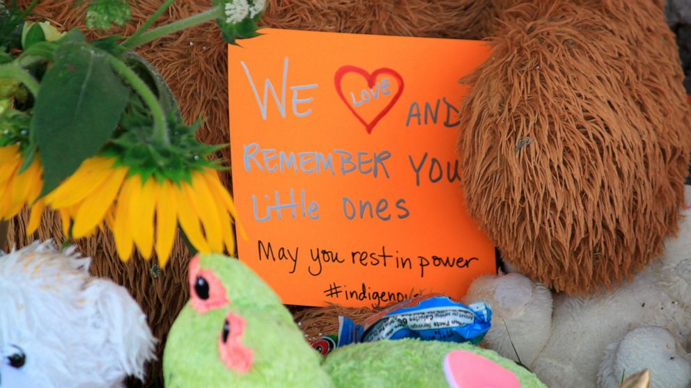 A makeshift memorial for the dozens of Indigenous children who died more than a century ago while attending a boarding school that was once located nearby is growing under a tree at a public park in Albuquerque, N.M., Thursday, July 1, 2021. Indigeno