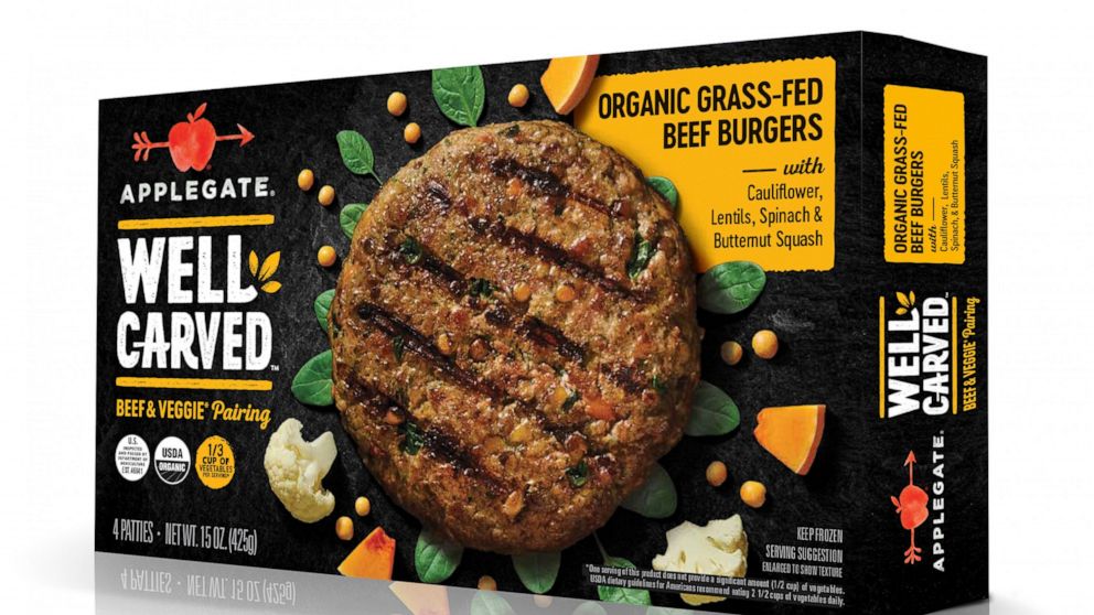 This undated photo provided by Applegate Farms shows Applegate Well Carved Organic Grass-Fed Beef Burgers, a line of meat-and-veggie burgers which the company is introducing at grocery stores next month. (Applegate Farms via AP)