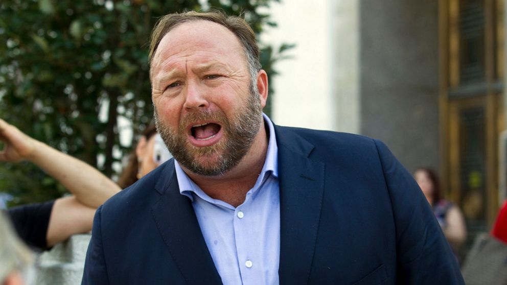 FILE- In this Sept. 5, 2018, file photo conspiracy theorist Alex Jones speaks outside of the Dirksen building of Capitol Hill in Washington. On Thursday, June 23, 2020, the Connecticut Supreme Court has upheld a sanction against the Infowars host ove