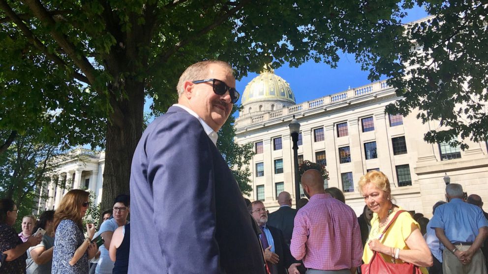 FILE - Former coal executive Don Blankenship waits outside the West Virginia Capitol on Wednesday, Aug. 29, 2018, after the Capitol was evacuated due to a fire alarm in Charleston, W.Va. Three reporters from a Pulitzer Prize-winning newspaper in West