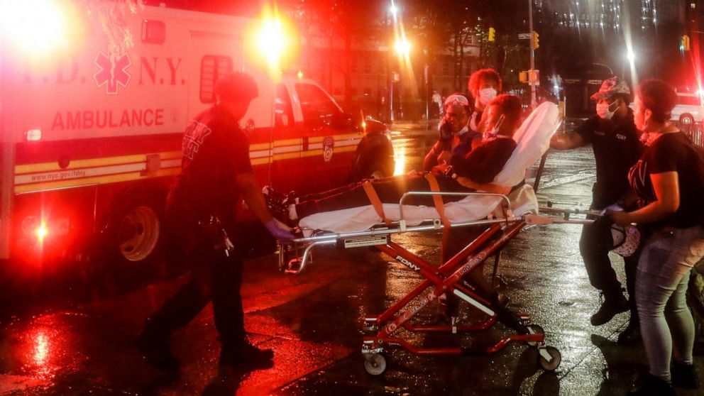 A protester is loaded into an ambulance after a rally calling for justice over the death of George Floyd, Wednesday, June 3, 2020, in the Brooklyn borough of New York. Floyd died after being restrained by Minneapolis police officers on May 25. (AP Ph