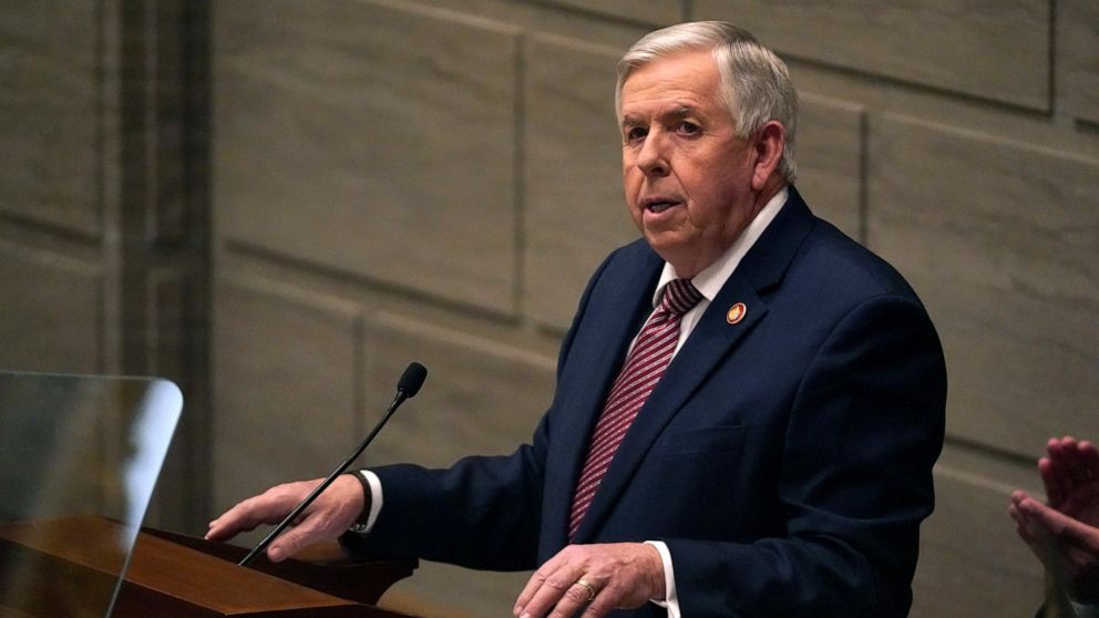 FILE - In this Jan. 27, 2021 file photo, Missouri Gov. Mike Parson delivers the State of the State address in Jefferson City, Mo. Federal officials are pushing back after Parson said he doesn't want government employees going door-to-door to urge peo