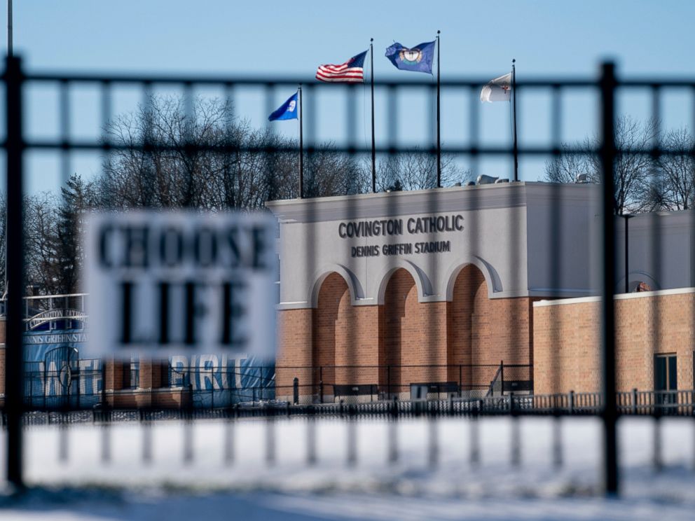Flags fly over the Covington Catholic High School stadium in Park Kills, Ky., Sunday, Jan 20, 2019. A diocese in Kentucky has apologized after videos emerged showing students from the Catholic boys high school mocking Native Americans outside the Li