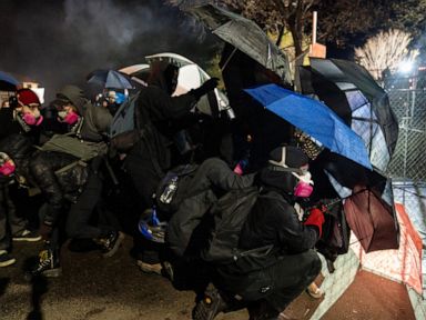 Armed patrol group tries to keep the peace in Minneapolis