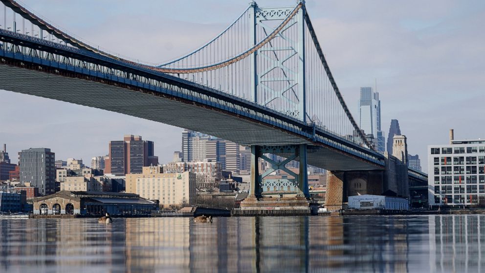 FILE - The Philadelphia side of the Benjamin Franklin Bridge spanning the Delaware River is pictured on Feb. 10, 2021. On Wednesday, Dec. 7, 2022, the Delaware River Basin Commission, a regulatory agency responsible for the water supply of more than 