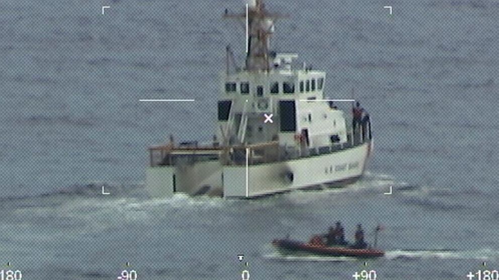 Coast Guard Cutter Ibis' crew searching for people missing from a capsized boat off the coast of Florida, Tuesday, Jan. 25, 2022. The Coast Guard searched through the night Wednesday for 39 people missing from a capsized boat after a solitary survivo