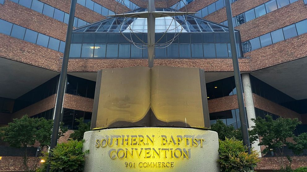 FILE - A cross and Bible sculpture stand outside the Southern Baptist Convention headquarters in Nashville, Tenn., on May 24, 2022. The Executive Committee of the Southern Baptist Convention said Friday, Aug. 12, 2022, that several of the denominatio