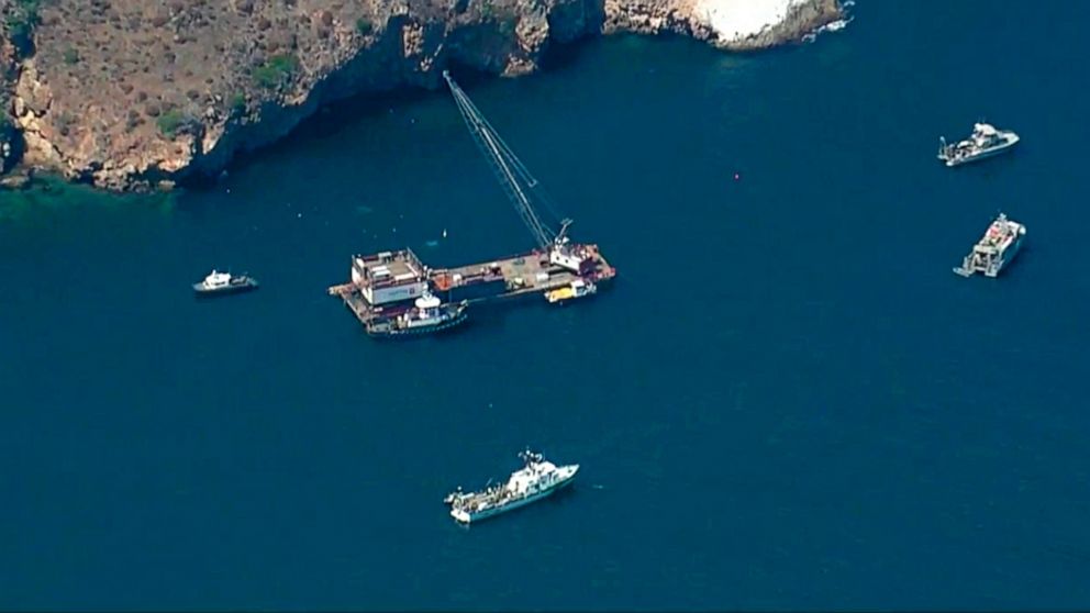 This photo from video provided by KABC-TV shows divers resuming their search Wednesday, Sept. 11, 2019 for the final missing victim who perished in a boat fire off the Southern California coast. The victim is one of 34 who died at sea last week near 