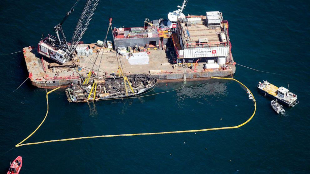 The burned hull of the Conception is brought to the surface by a salvage team, Thursday, Sept. 12, 2019, off Santa Cruz Island, Calif., in the Santa Barbara Channel in Southern California. The vessel burned and sank on Sept. 2, taking the lives of 34