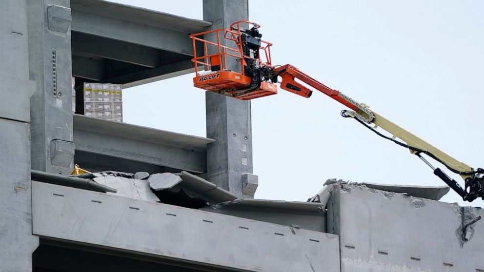 FILE - In this Sept. 11, 2020 photo, damage is seen to a parking deck under construction after it partially collapsed, injuring several workers in Atlanta. The parking deck under construction has collapsed for a second time in as many days. Atlanta F