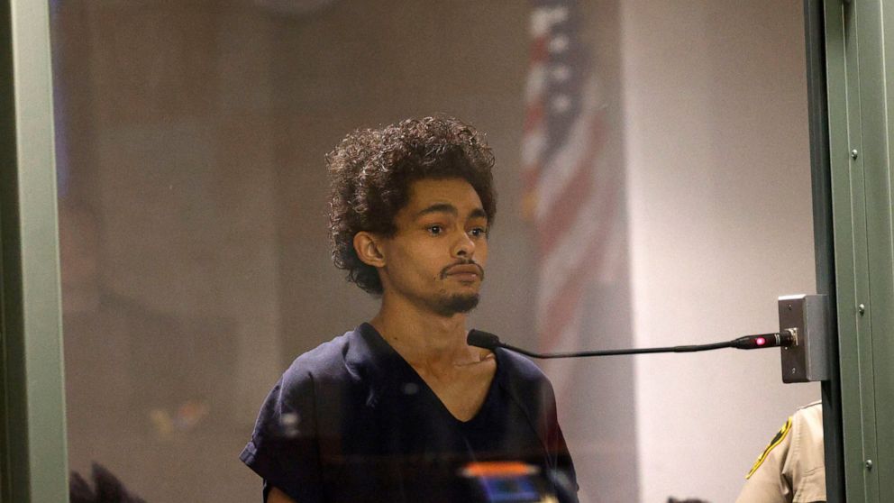  Prosecutor: Man held in Vegas officer killing fired 18 shots