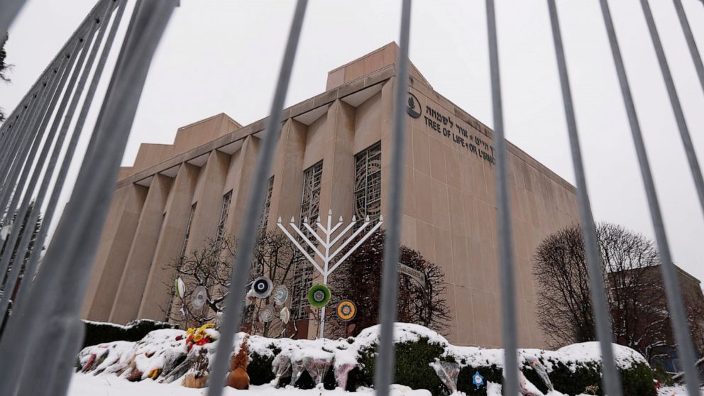FILE--This file photo from Feb. 11, 2019 shows a temporary barrier around the Tree of Life Synagogue in Pittsburgh where 11 people were killed and seven others injured during an attack on in October of 2018. The synagogue is inviting young people wor