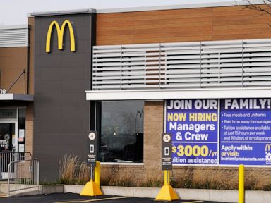 US jobless claims fall to 547,000, another pandemic low