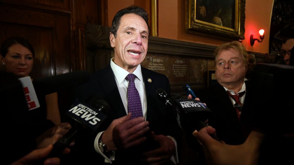FIL E- In this Jan. 9, 2019 file photo, Gov. Andrew Cuomo speaks to reporters on the opening day of the legislative session at the Capitol in Albany, N.Y. Efforts to legalize marijuana for recreational use in New York are gaining steam and the govern