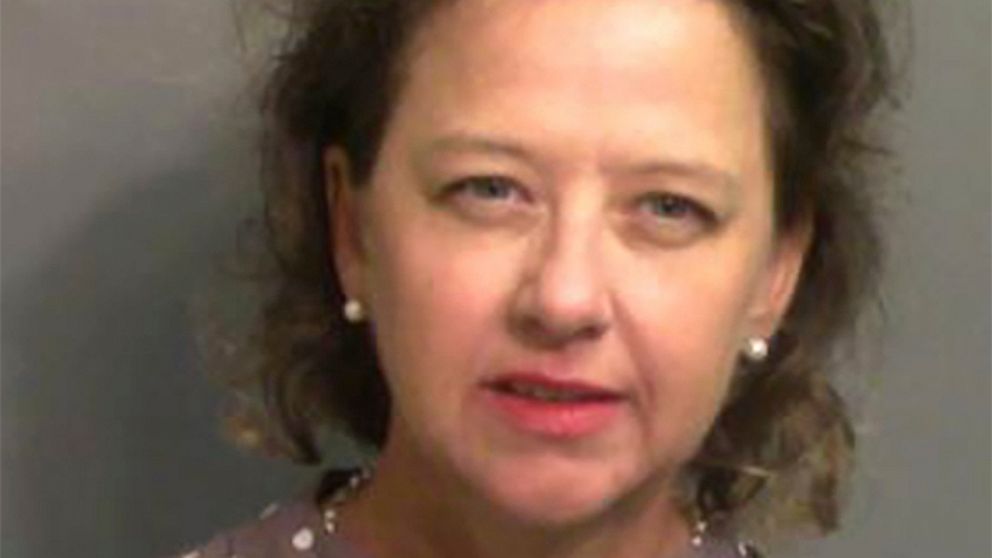 FILE - This jail booking photo provided by Glynn County Sheriff's Office, shows Jackie Johnson, the former district attorney for Georgia's Brunswick Judicial Circuit, after she turned herself in to the Glynn County jail in Brunswick, Ga, on Wednesday