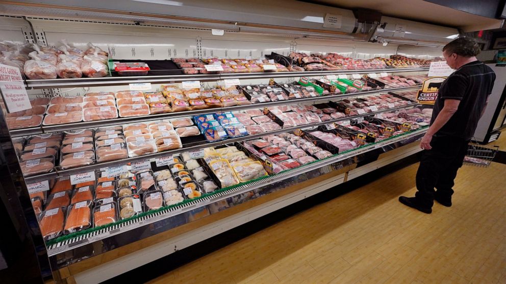 A man looks at beef in the meat department at Lambert's Rainbow Market, on June 15, 2021 in Westwood, Mass. The Labor Department said Thursday, Feb. 10, 2022, that consumer prices jumped 7.5% last month compared with a year earlier, the steepest year