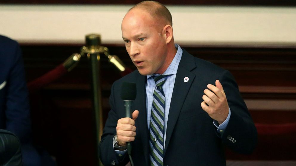Rep. Spencer Roach, R-North Fort Myers, closes on his sponsored bill to ban the banning of sunscreen containing ingredients that some researchers say harm coral reefs during session Tuesday, March 10, 2020, in Tallahassee, Fla. (AP Photo/Steve Cannon)