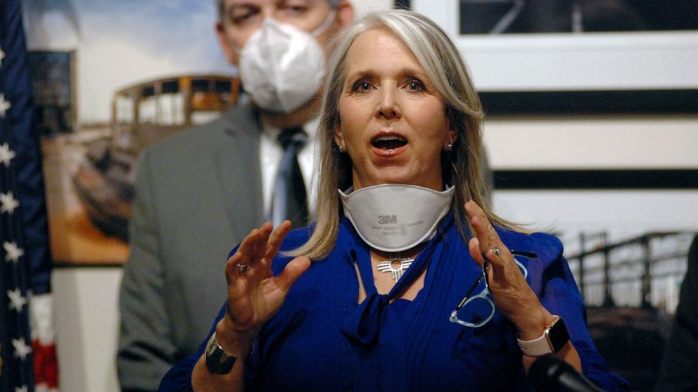 FILE - In this June 11, 2021, file photo, New Mexico Gov. Michelle Lujan Grisham speaks during a news conference at the state Capitol building in Santa Fe, N.M. The governor says all remaining pandemic-related public health restrictions on commercial