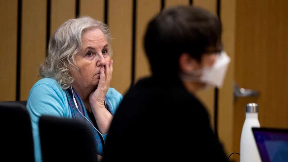 FILE - Romance writer Nancy Crampton Brophy, left, accused of killing her husband, Dan Brophy, in June 2018, watches proceedings in court in Portland, Ore., on April 4, 2022. She was sentenced Monday, June 13, 2022, to life in prison with the possibi