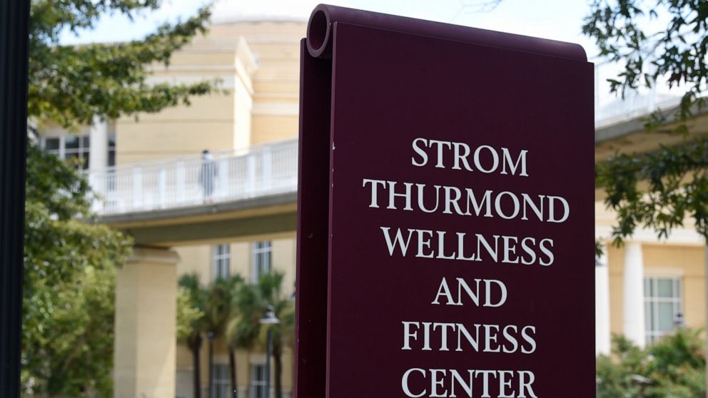 FILE - In this Aug. 20, 2020, file photo, a sign advertises the Strom Thurmond Wellness and Fitness Center in Columbia, S.C. University officials have said they won’t ask the Legislature to change building names but instead will concentrate on honori