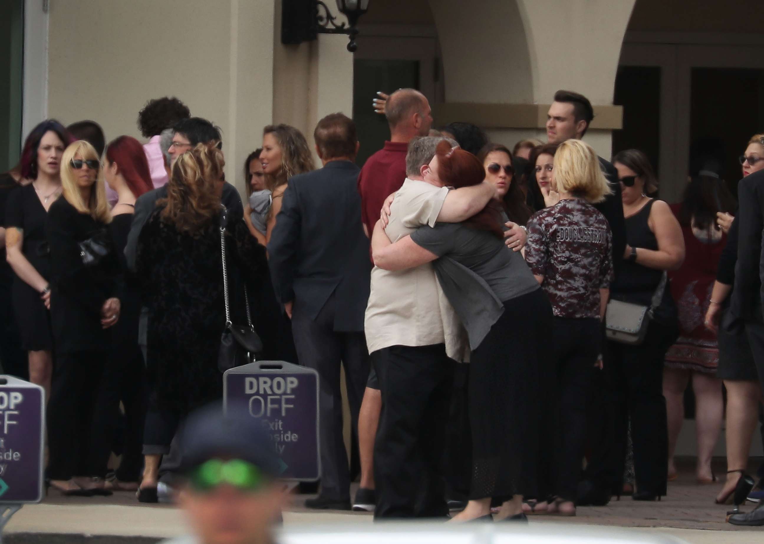 PHOTO: Mourners attend the funeral of Aaron Feis who was the football coach at Marjory Stoneman Douglas High School at Church by the Glades on Feb. 22, 2018 in Coral Springs, Fla.