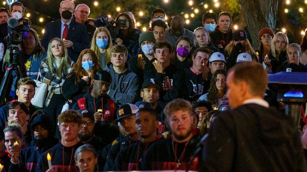 PHOTO: University of Utah athletic director Mark Harlan addresses hundreds of athletes, students, and professors who packed the student union lawn to remember Aaron Lowe during a candlelight vigil, Sept. 29, 2021, in Salt Lake City.