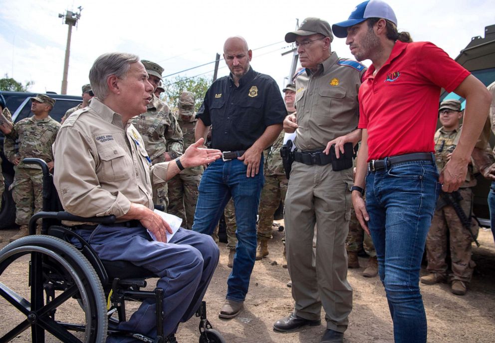 PHOTO: TTexas Gov. Greg Abbott speaks with Del Rio Mayor Bruno Lozano before giving a press conference, Sept. 21, 2021, near the Rio Grande.