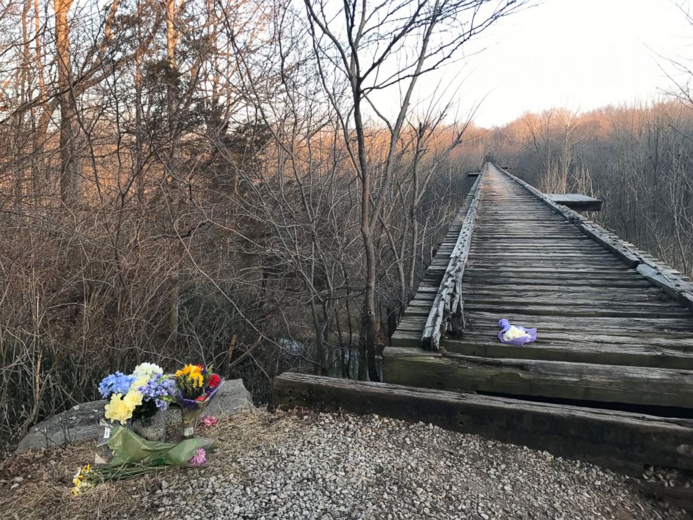 PHOTO: Flowers sit by a bridge near Delphi, Ind. where Liberty German and Abigail Williams were seen before they were reported missing by their families on Feb. 13, 2017.