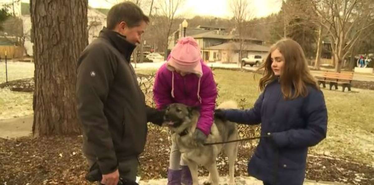 The Haddock family of Saugatuck, Mich., poses with Ryder, who was approved for unemployment benefits.