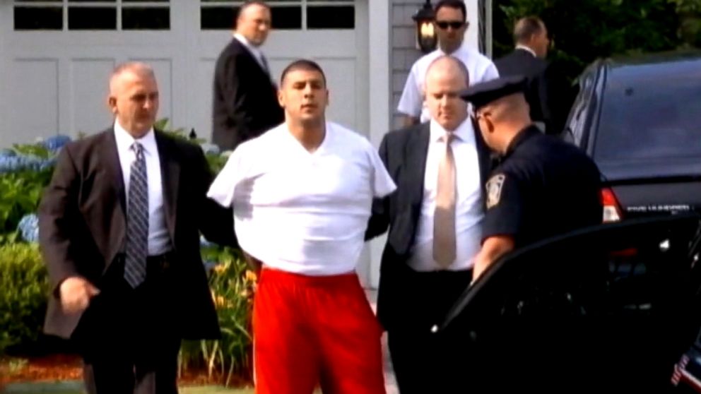 PHOTO: Former New England Patriots player Aaron Hernandez was arrested at his home on June 26, 2013, and was charged with the death of his friend Odin Lloyd later that day. 