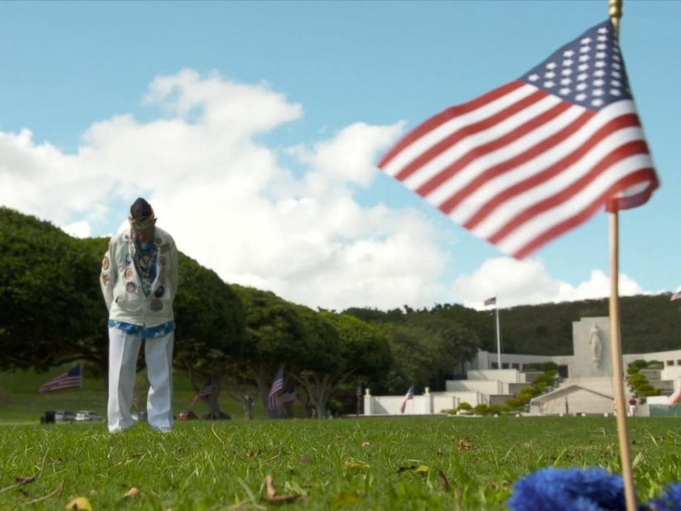 PHOTO: Pearl Harbor survivor Stuart Hedley visits the burial site of those killed during the 1941 attack.