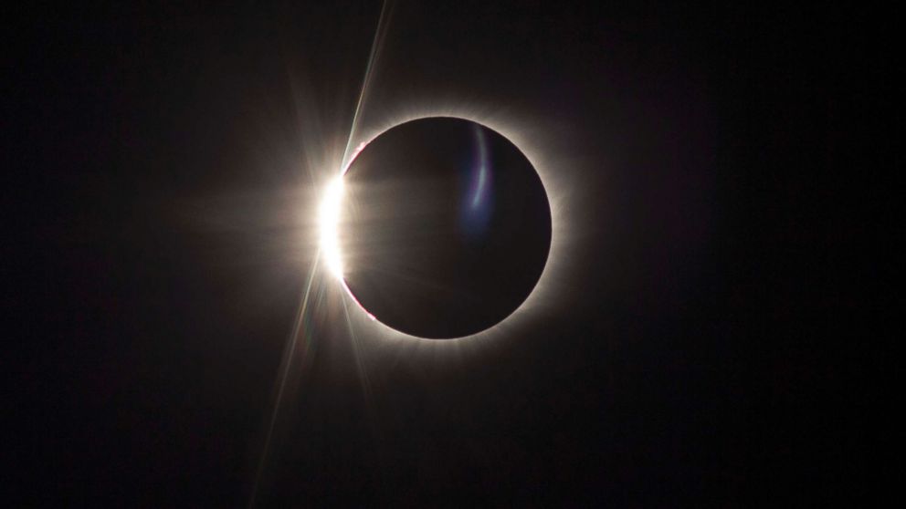 The "diamond ring" effect is visible as the Earth's moon passes in front of the sun during a solar eclipse viewed from Madras, Ore., Aug. 21, 2017.