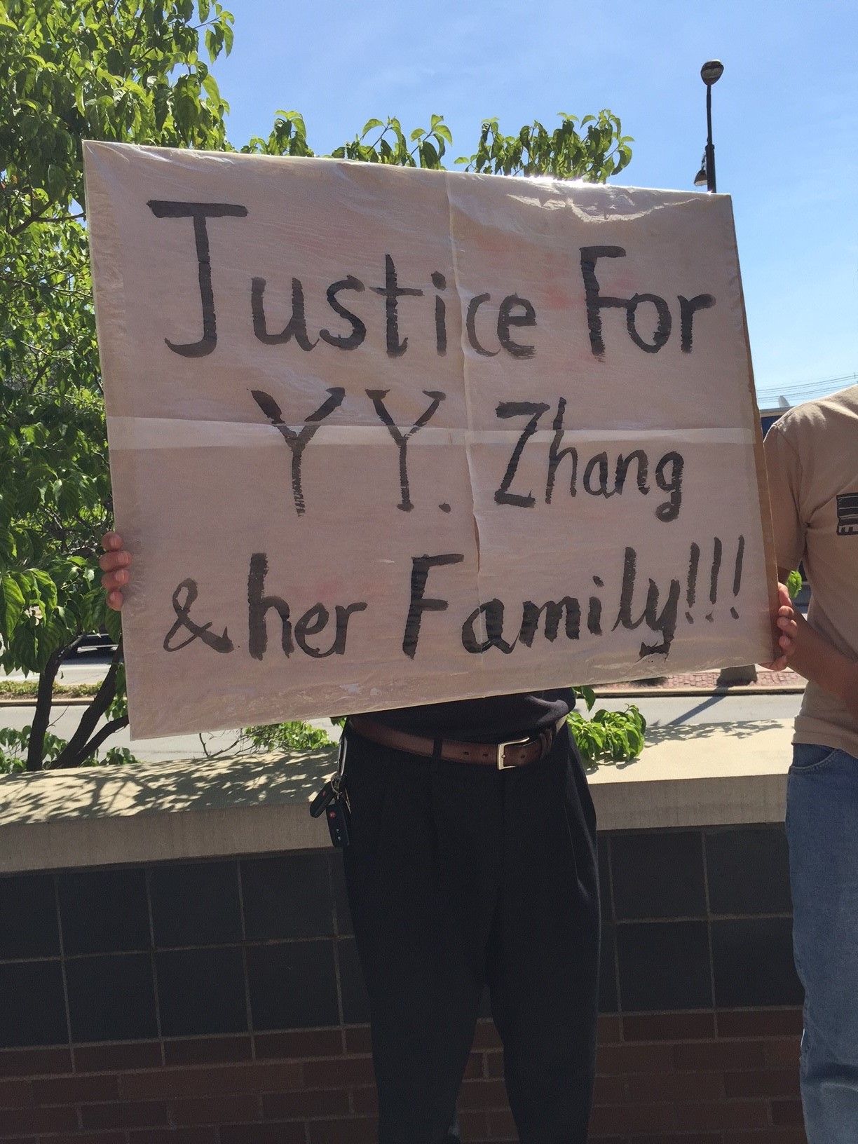 PHOTO: Students, facility and community members outside the federal courthouse in Urbana, Ill., where Brendt Christensen was appearing in court, July 3, 2017.