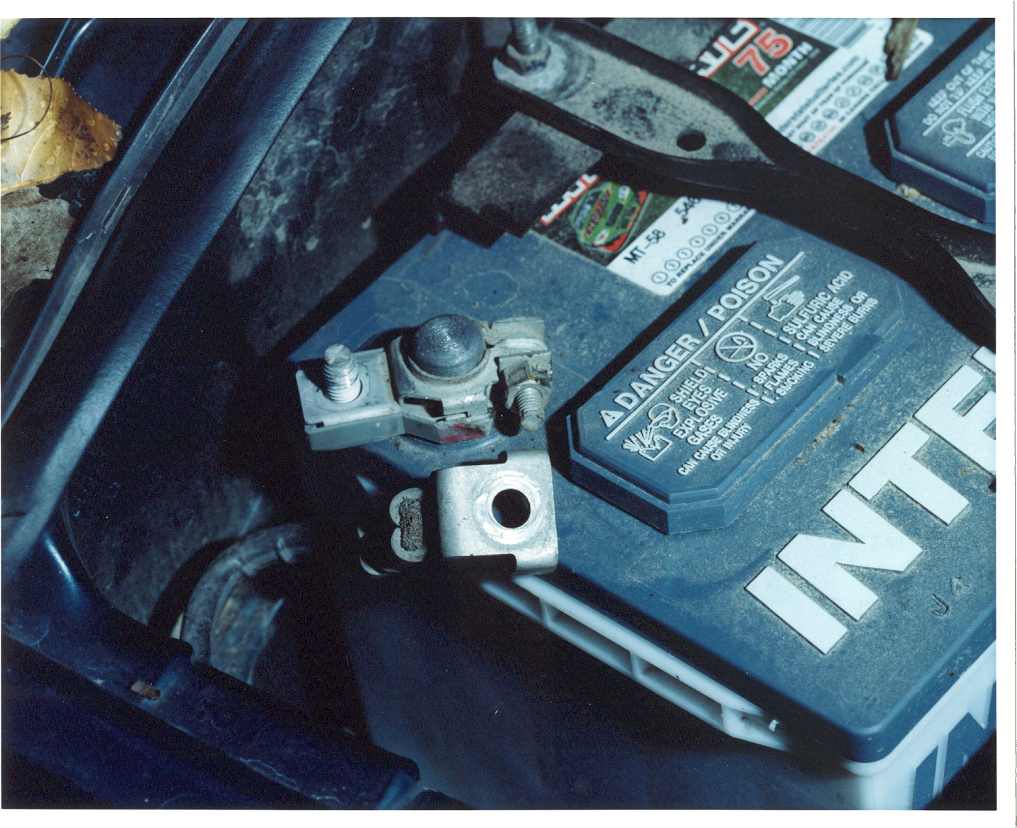 Evidence photo the state presented at Steven Avery's murder trial showing under the hood of Teresa Halbach's car.